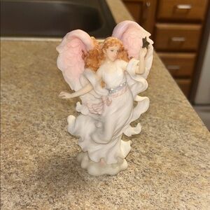 Porcelain Angel Figurine with Pink Wings